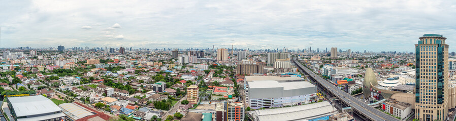 Bangkok panorama city view from high building. Bangkok skyline with local home, street and traffic.
