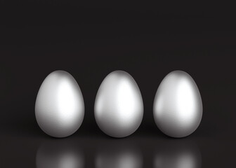 Three silver eggs on a black background. Easter holiday. 3D rendering and 3D illustration.