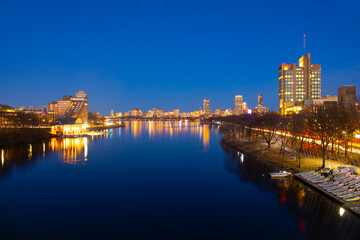 Boston Skyline at night from Boston University Bridge, Boston, Massachusetts, USA. City of Cambridge is on the left and Boston Back Bay is on the right in this photo. 