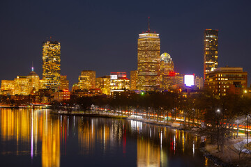 Fototapeta na wymiar Boston Skyline at night from Boston University Bridge, Boston, Massachusetts, USA. City of Cambridge is on the left and Boston Back Bay is on the right in this photo. 
