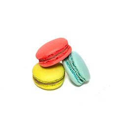 Macaroons isolated in white background. Colorful french macarons close-up. Tasty sweet color macaroon, bakery concept.