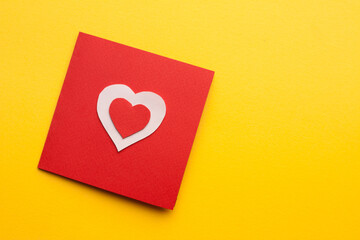 card with heart valentine holiday decoration yellow background
