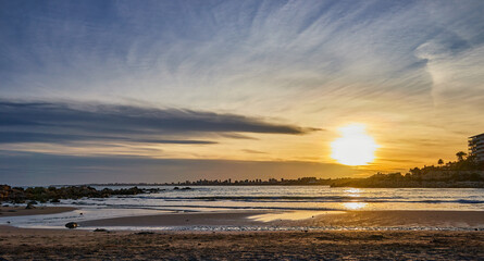 landscape on the beach of warm colors at sunset