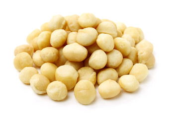 Shelled and unshelled macadamia nuts on white background 