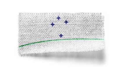 Mercosur flag on a piece of cloth on a white background