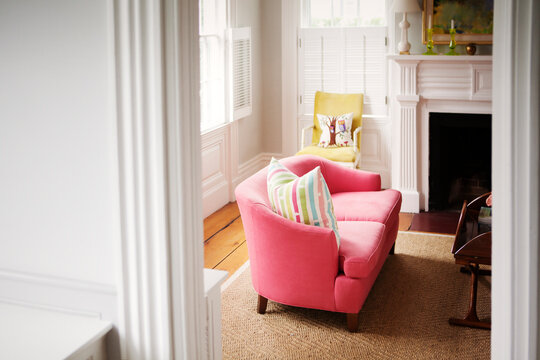 Pink sofa in living room at home