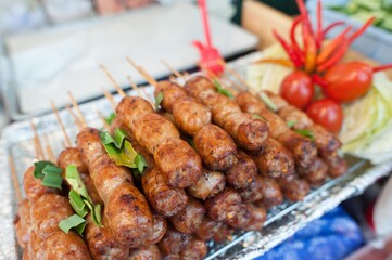 Isaan pork sausage recipe with side dishes
