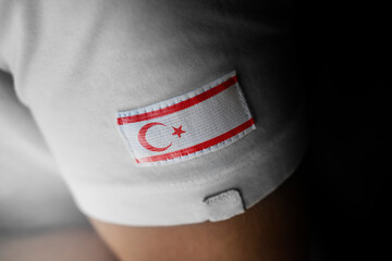 Patch of the national flag of the Northern Cyprus on a white t-shirt