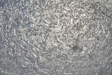 sun shines through the ice pattern