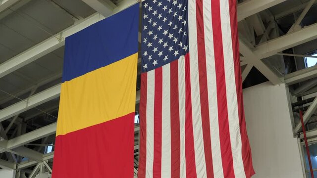 Flags of United States of America and Romania, next to each other