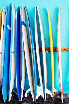 Rack of surfboards in shop