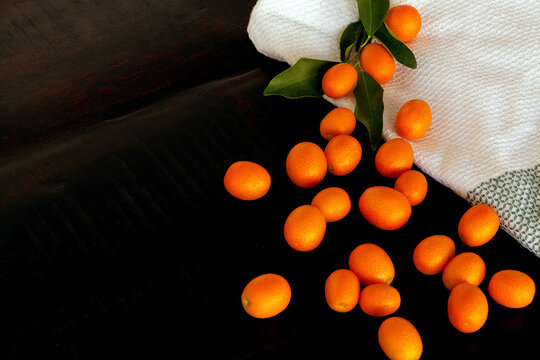 Overhead view of kumquat on table
