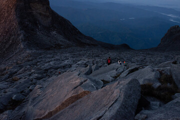 climbing Mount Kinabalu with sun rise  