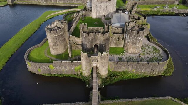 Caerphilly town, Wales landmark large medieval castle, aerial view