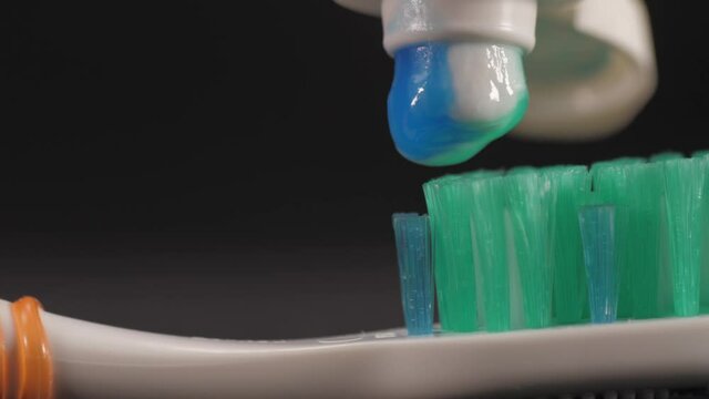 tooth brush with tooth paste macro shot 4k