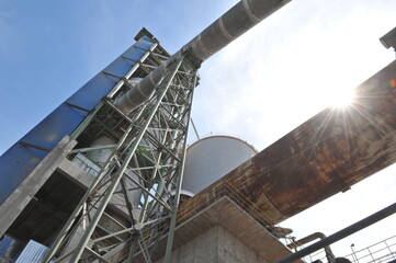 Zhambyl region, Kazakhstan - 05.15.2013 : Tanks and pipes connecting different sectors of the cement plant