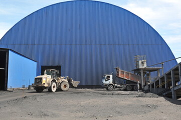Zhambyl region, Kazakhstan - 05.15.2013 : Hangar for storage of stone rocks that are imported by KAMAZ trucks