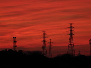 Tokyo,Japan-February 10, 2021: Silhouette of power line at dawn in Tokyo
