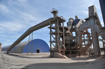 Zhambyl region, Kazakhstan - 05.15.2013 : Tanks and pipes connecting different sectors of the cement plant