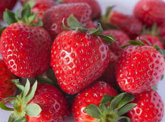 red ripe strawberries in closeup