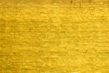 orange amber plastered brick wall background