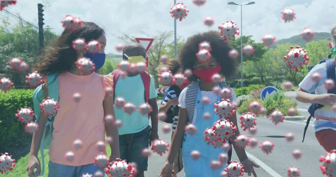 Animation Of Floating Covid 19 Cells And Schoolchildren Wearing Face Masks Walking To School