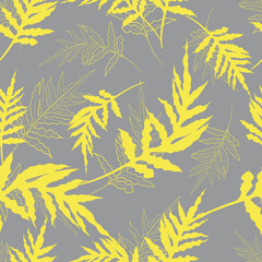 Seamless monochrome pattern with yellow tropical fern leaves. Botanical summer texture. On gray background.