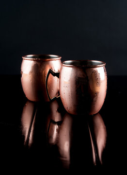 Close-up of Moscow mules against black background