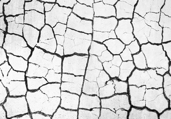 Background image of a wall with cracks. Black and white image.