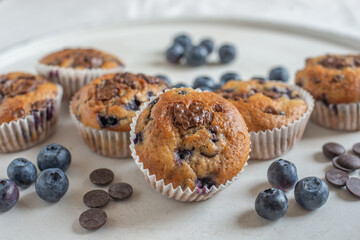 sweet home made chocolate blueberry muffins on a table