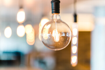 Close-up of illuminated light bulb