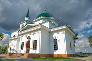 Fototapeta na wymiar Christian church against the blue sky.