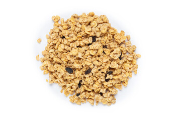 Healthy breakfast. Oat flakes with dried grapes on a white plate. Musli is healthy food. Space for text.