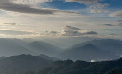 Landscape view of fog cover the mountain.
