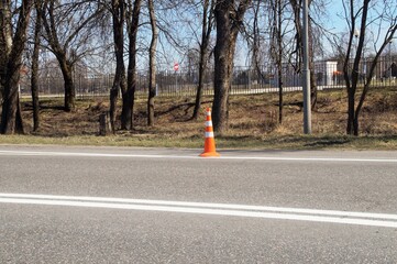 Avtomagsitral. The orange cone is installed in the emergency section of traffic 
