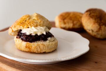homemade scones with clotted cream and jam