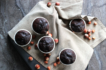 Chocolate muffins in a white baking dish