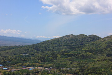 Fototapeta na wymiar 山中湖の東にある高指山からの風景。山と雲