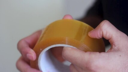 Trying to find the tip of the adhesive tape - Powered by Adobe