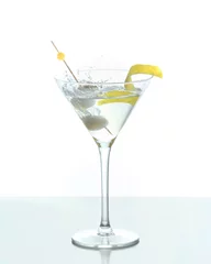 Foto op Plexiglas Splash from olive in a glass of cocktail. © Alejandro