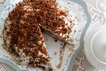 Appetizing homemade cake with coffee biscuit and sour cream