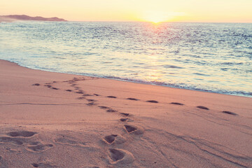 Sandy beach at sunrise