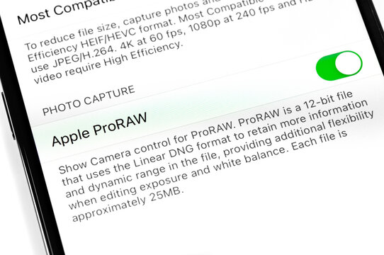 iPhone 12 Pro Max Camera settings, Apple ProRAW on screen. Apple is a multinational technology company. Moscow, Russia - January 16, 2021