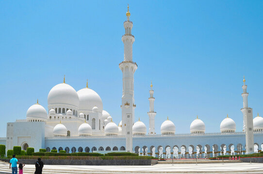 Exterior of Sheikh Zayed Mosque against clear blue sky during sunny day