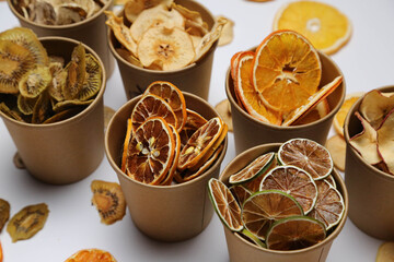 Dried fruit on colored background. Pattern of a fruit frips. Healthy eating