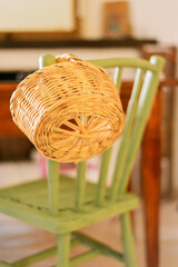 Vintage chair with wicker basket