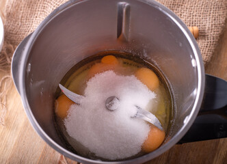 eggs and sugar in mixer  preparing for whipping