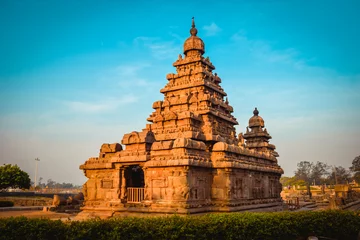 Papier Peint photo Lieu de culte Shore temple in morning light built by Pallavas is UNESCO World Heritage Site located at Great South Indian architecture, Tamil Nadu, Mamallapuram or Mahabalipuram