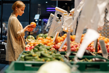  young girl are shopping at a supermarket