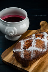 Homemade banana bread with jam and copy space.
